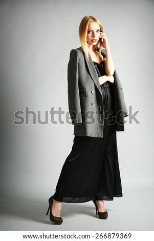 Expressive young model on gray background