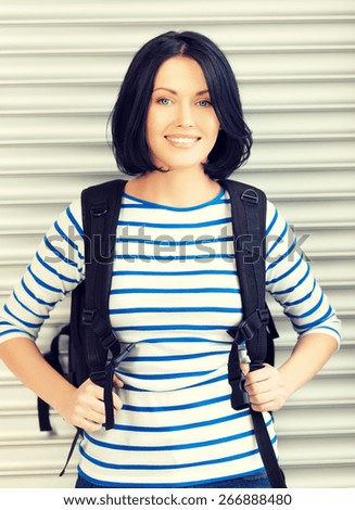 bright picture of attractive woman with bagpack..