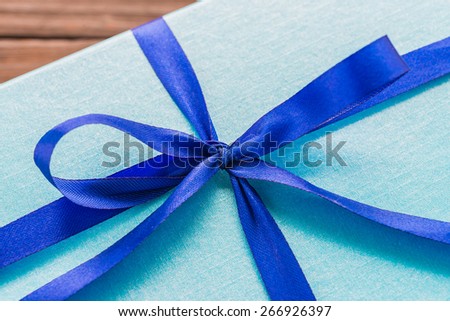 Gift box on wood background - vintage effect style pictures