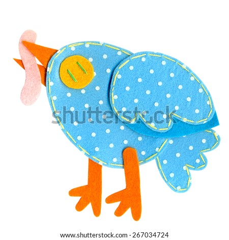 Handmade polka dot felt bird. Blue bird with worm. 
