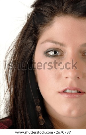 Half Face Portrait Of A Pretty Brunette Young Woman