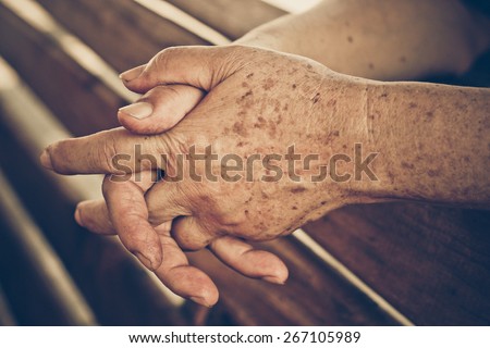 hands of a female elderly Royalty-Free Stock Photo #267105989