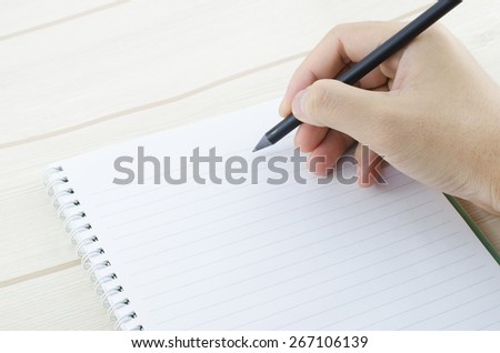 Hand write on the notebook Royalty-Free Stock Photo #267106139