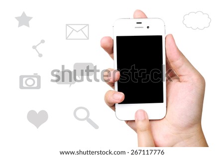 Smart phone in hand on social media icons background, business, technology, digital marketing concept