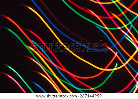 Long exposure small neon lights texture. Modern art. Abstract colourfull neon light.