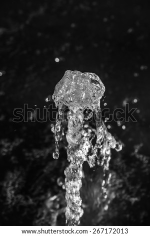 Water splash isolated on black
