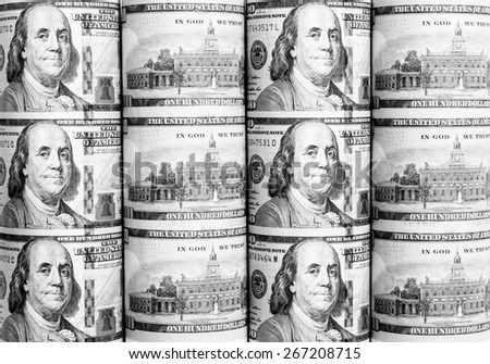 Roll background of hundred  dollars notes with black and white color