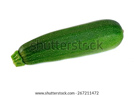 Fresh zucchini isolated on white Royalty-Free Stock Photo #267211472