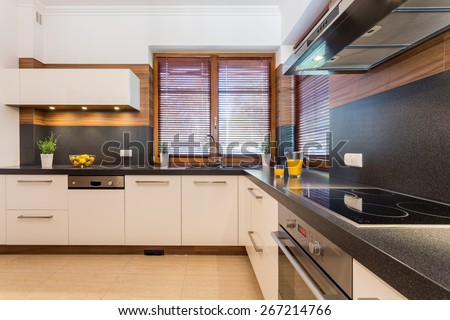 Picture of spacious kitchen with black wheat