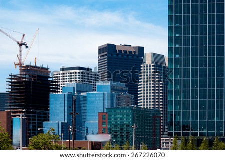 Downtown of Boston view. Business development. Skyscrapers side view against of the sky in Boston. Headquarters of Big corporations. Typical urban landscape. Contemporary architecture. Modern district