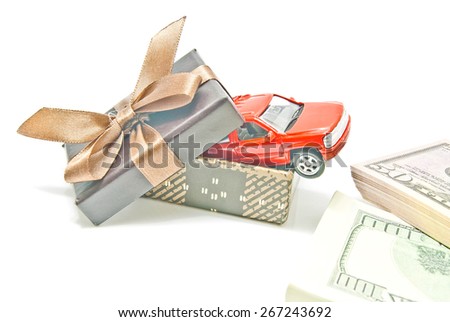 gift box with car and money on white 