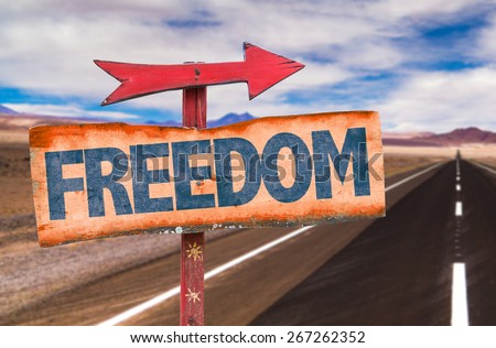 Freedom sign with road background Royalty-Free Stock Photo #267262352
