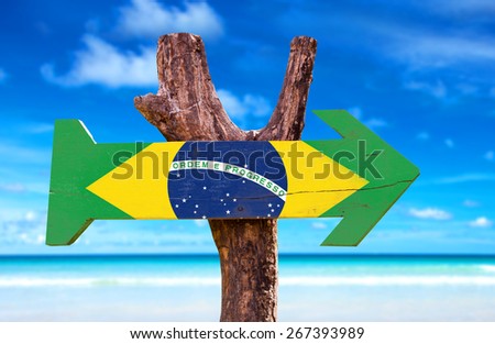 Brazil Flag wooden sign with beach background