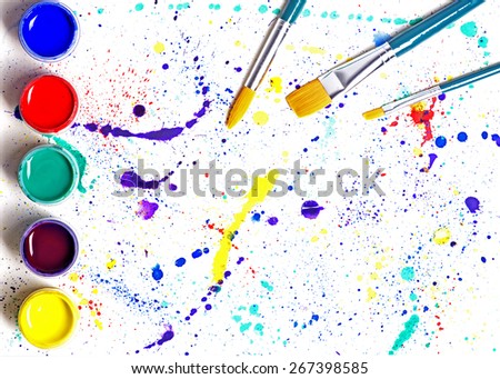 Paintbrush and gouache paint abstract art on white background