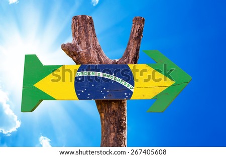Brazil Flag wooden sign with sky background