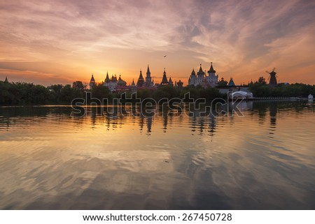 Summer landscape with russian Kremlin at sunset with interesting sky. Izmailovo Park,  Moscow, Russia