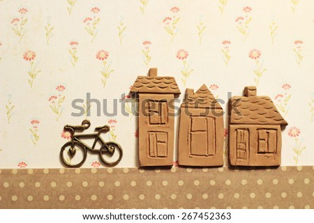 ceramic houses and bicycle 