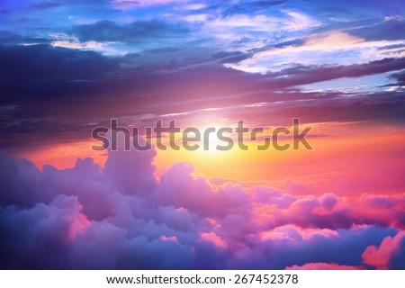 Sunset above the clouds Royalty-Free Stock Photo #267452378