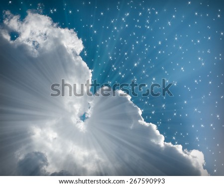 Abstract background with glowing sun with blue sky and white clouds