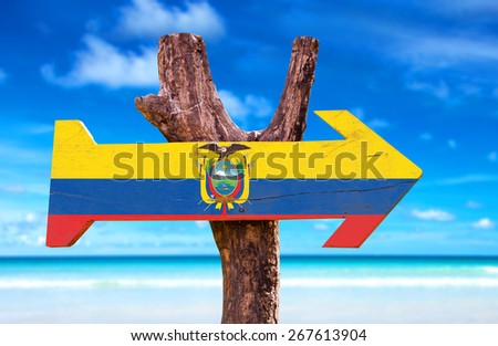 Ecuador Flag wooden sign with beach background