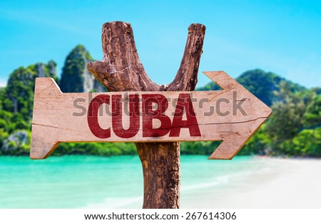 Cuba wooden sign with beach background