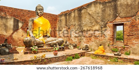 Buddha statue in Wat Worachetharam. Ayutthaya historical park. Panorama