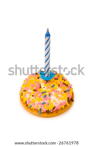 Cup cake and candle isolated on the white background
