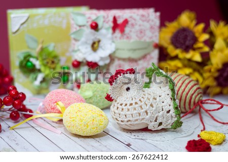 Close up picture on set of colorful eggs, chicken and gift decorations