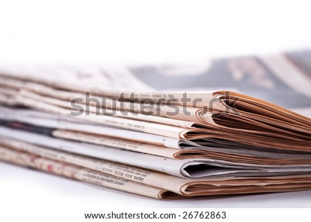 Pile of newspaper on white background