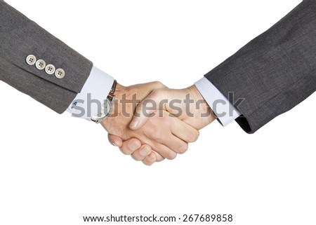 Close-up of businessmen shaking hands over white background
