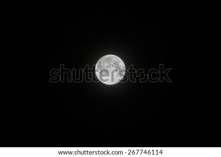 Full moon in a dark black night