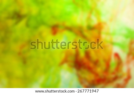 deliberately blurred; colored dye in a water as a psychedelic background