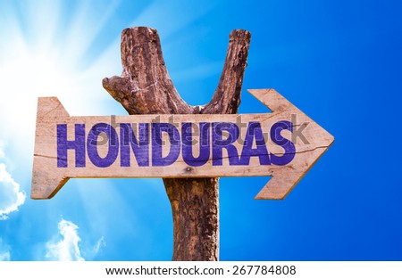 Honduras wooden sign with sky background