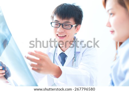 bright picture of male doctor with patient