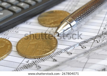 Financial background with money, calculator, table and pen.