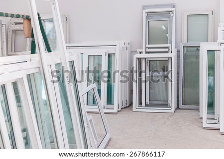 PVC windows and doors manufacturing, window frame profile production, window replacement Royalty-Free Stock Photo #267866117