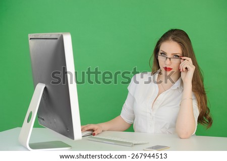 Computer. Laptop.Woman.Girl. Businesswoman.Girl working at the l