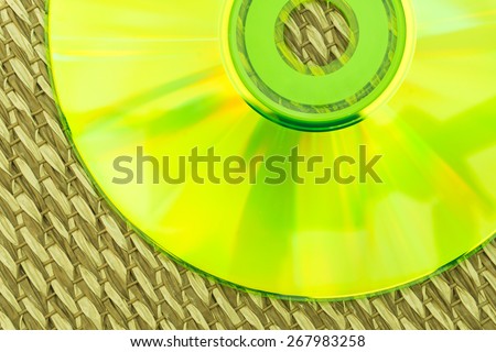 Half Green CD Placed on a Japanese Mat