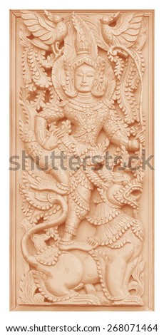 Traditional Thai style wood carving on the wall of Temple in Thailand