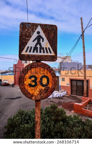 Vintage Old Rusty Road Sign Consumed by the Time