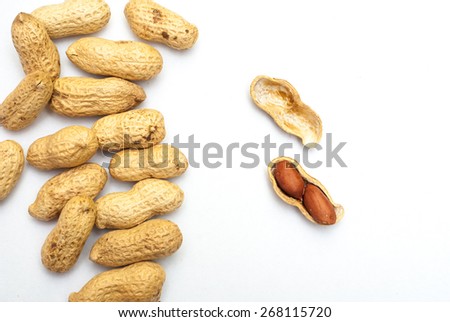 Photo of peanuts on white with soft shadow.