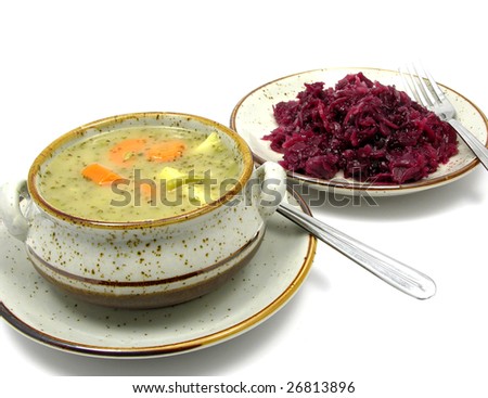 Potato stew and cooked red cabbage arranged on a plates