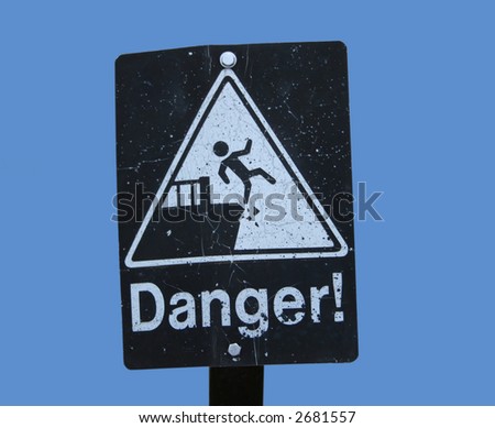 Danger cliff sign with figure falling