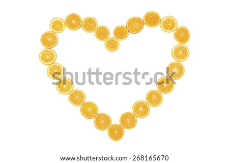 Stock picture of sliced oranges, forming a heart, on a white background