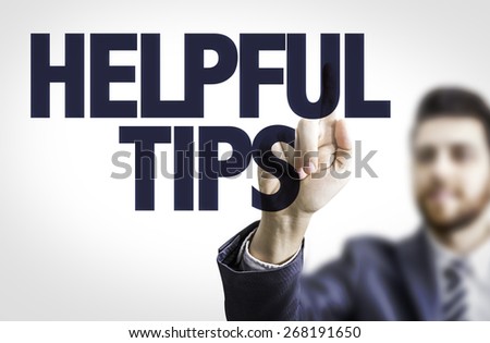 Business man pointing the text: Helpful Tips