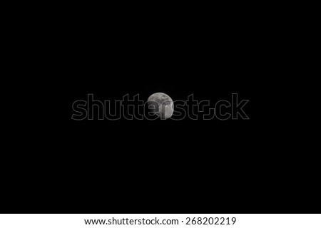 A  waxing gibbous lunar photo.