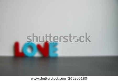 Colorful Wooden word love with white background in Blur style