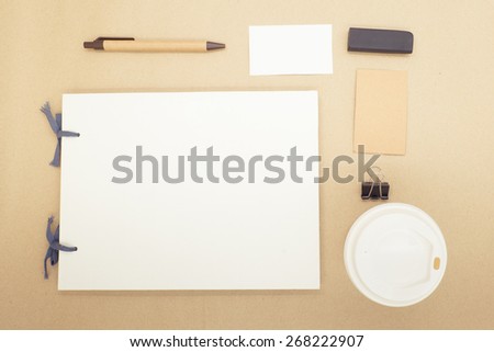 Top view of coffee and stationery mockup set with retro filter effect