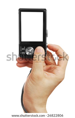 The digital camera in a hand