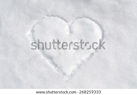 Imprint heart and palms of the hands in the snow.